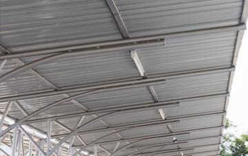 installing Tan Office metal roofing